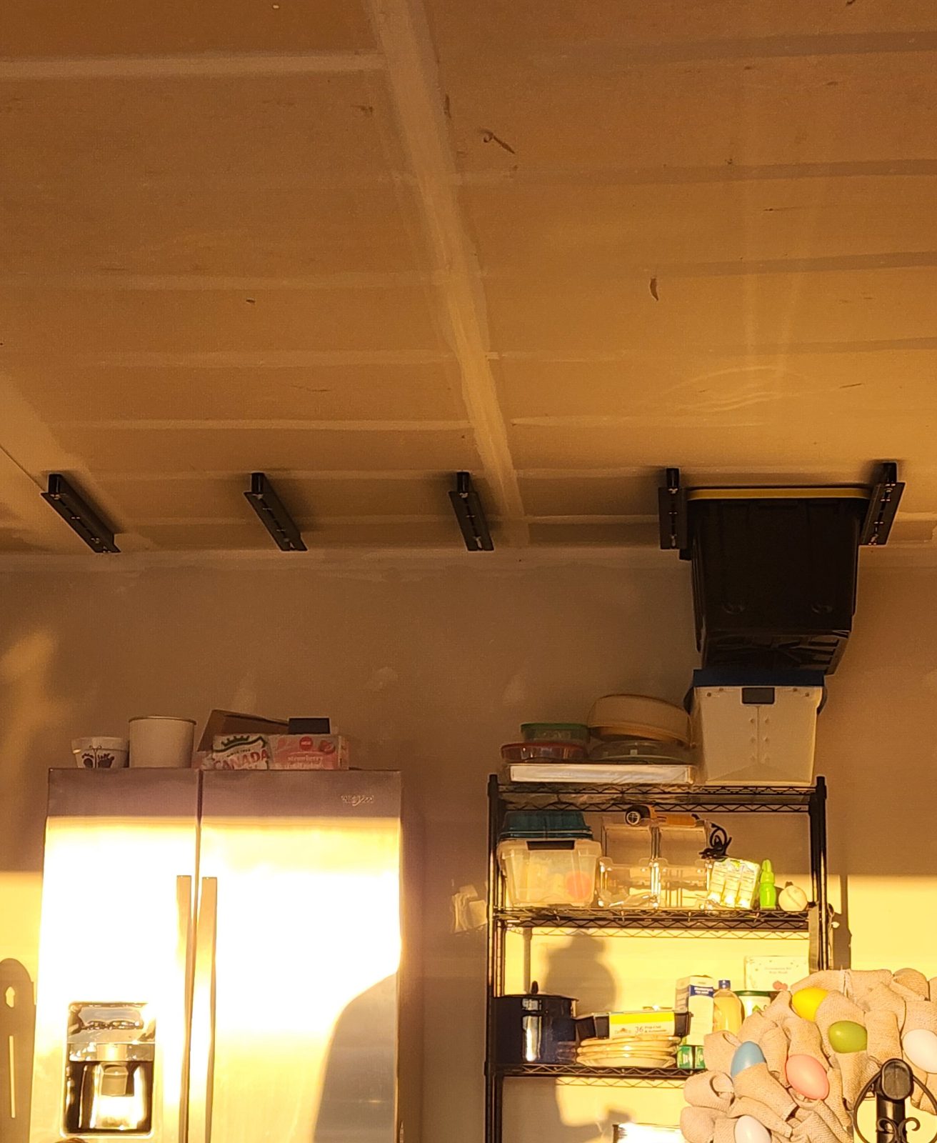 Adding Ceiling-Mounted Storage Tote Holders to the Garage