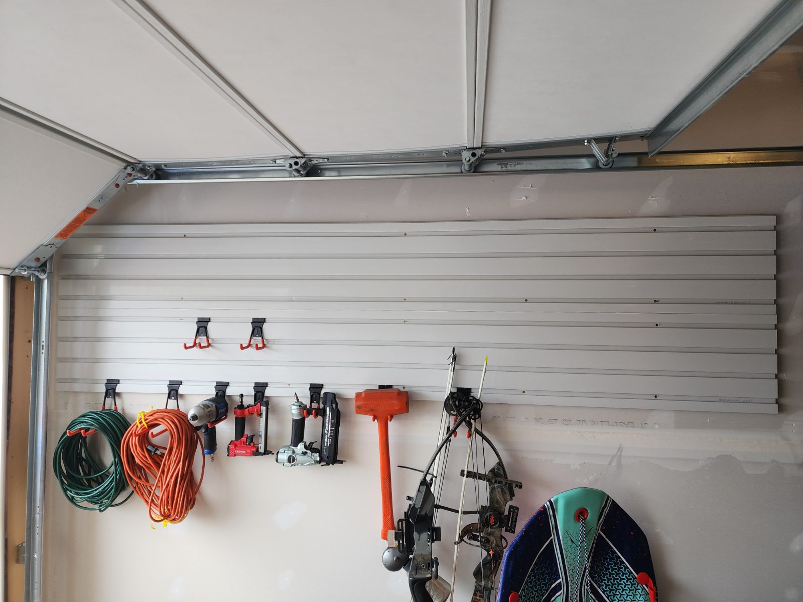 Turning Dead Space Above the Garage Door Into a Gear Wall